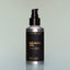A bottle of Bold Fortune full-size Beard Oil with a pump dispenser against a grey background.