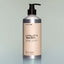 A bottle of Tree Ranger Utility Wash with a pump dispenser against a grey background.