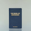 The Book of Reminders by Eric Bandholz against a grey background.