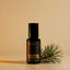 Beardbrand Norse Winter eau de parfum bottle with pine branch and cones symbolizing the fragrance’s crisp evergreen and winter forest scent.